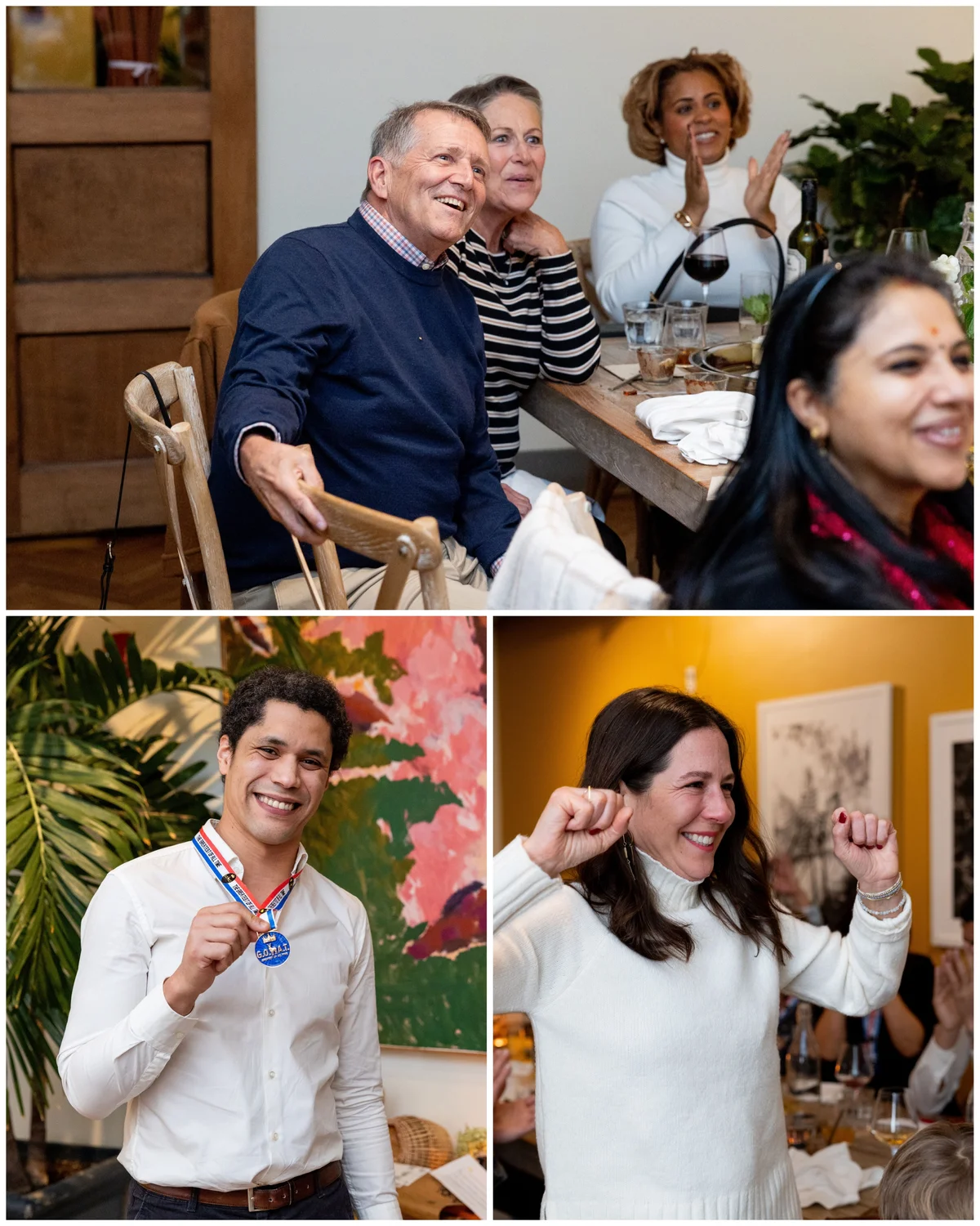 Team members celebrating and showing off their GOAT medals